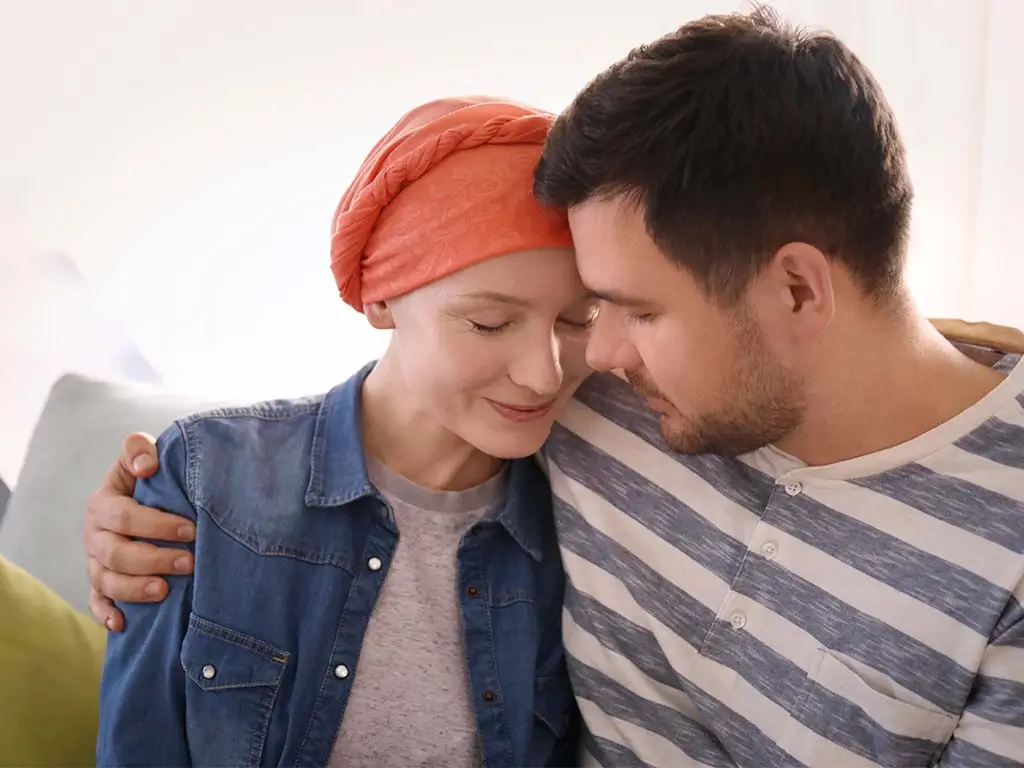 Partner supporting a loved one with cancer during treatment